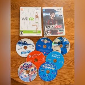 Nintendo Wii Game Disc Lot with Blue, White, Orange, Red Discs